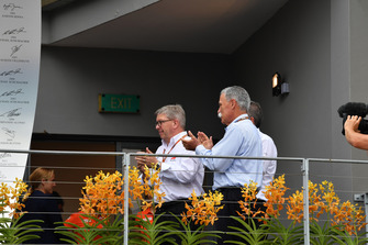 Ross Brawn, Formula One Managing Director of Motorsports and Chase Carey, Chief Executive Officer and Executive Chairman of the Formula One Group with F1 in Schools on the podium