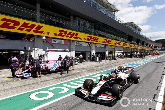Kevin Magnussen, Haas VF-20 and Sergio Perez, Racing Point RP20 