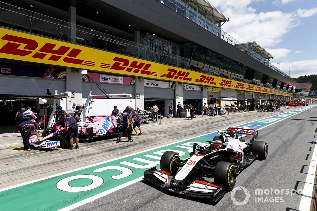 Kevin Magnussen, Haas VF-20 and Sergio Perez, Racing Point RP20