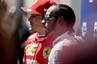 Charles Leclerc, Ferrari,. and pole man Lewis Hamilton, Mercedes AMG F1