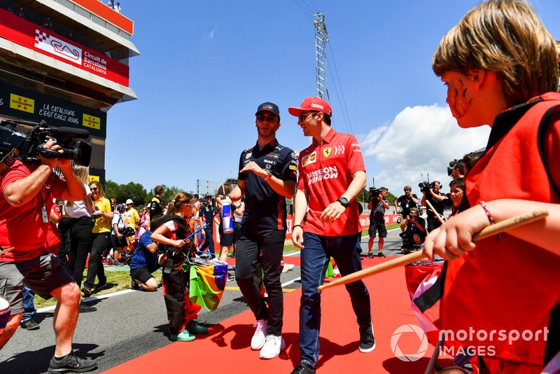 Pierre Gasly, Red Bull Racing, and Charles Leclerc, Ferrari, at the drivers parade