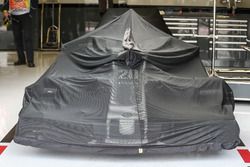 Haas F1 Team VF-17 under covers in the garage