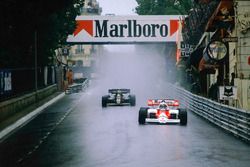 Alain Prost, McLaren MP4\2 TAG Porsche, at Mirabeau, followed by Nigel Mansell, Lotus 95T Renault