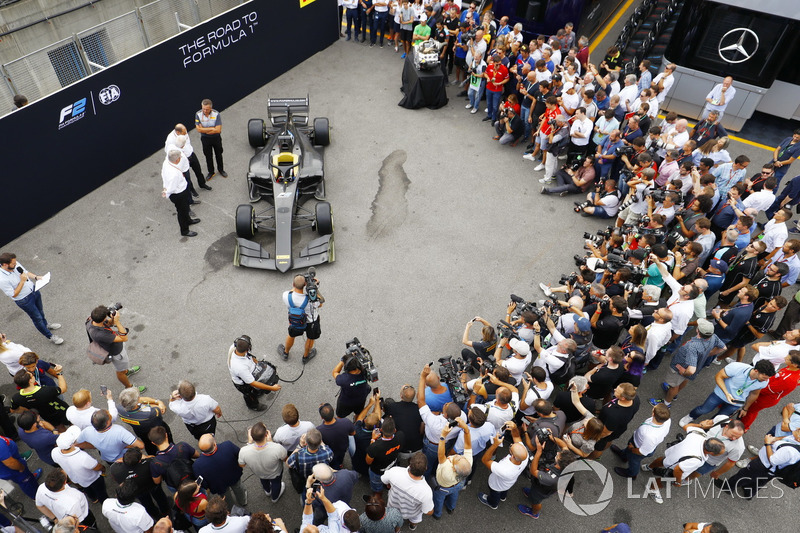 The new F2 car is revealed to the media