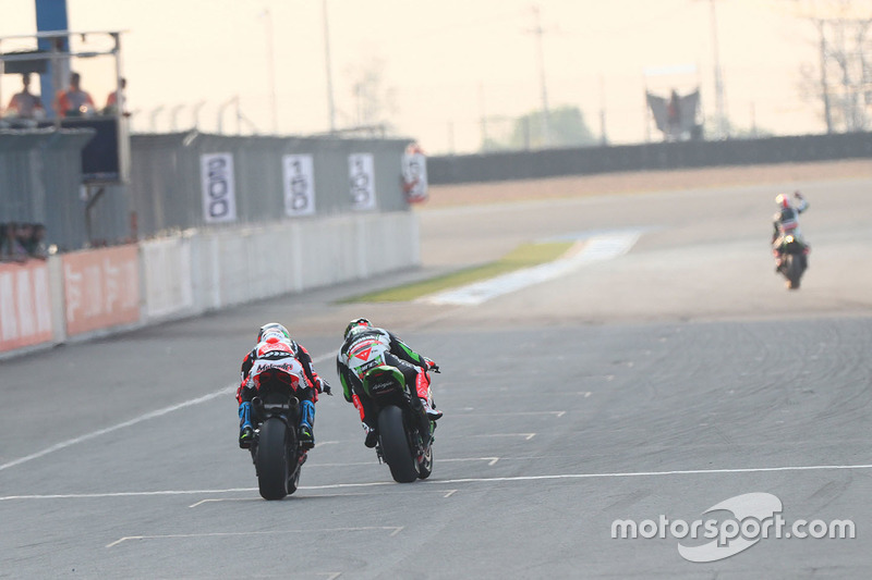 Marco Melandri, Ducati Team, Tom Sykes, Kawasaki Racing over the finish line