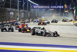 Nico Rosberg, Mercedes AMG F1 W07 Hybrid leads at the start of the race as Nico Hulkenberg, Sahara Force India F1 VJM09 crashes out