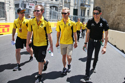 Esteban Ocon, Renault Sport F1 Team Test Driver and Kevin Magnussen, Renault Sport F1 Team walk the