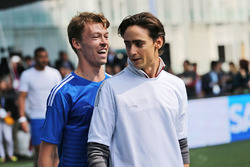 (L to R): Daniil Kvyat, Scuderia Toro Rosso with Esteban Gutierrez, Haas F1 Team at a charity footba