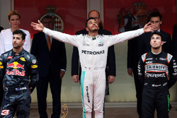 Lewis Hamilton, Mercedes AMG F1 celebrates on the podium with Daniel Ricciardo, Red Bull Racing and Sergio Perez, Force India