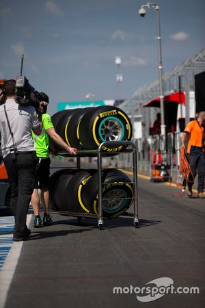 Pirelli tyres pushed on a trolley in the pits