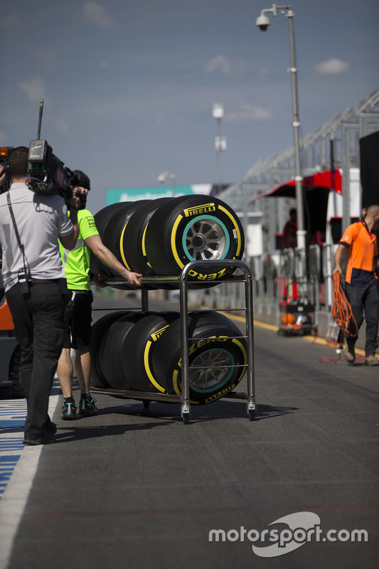 Pirelli tyres pushed on a trolley in the pits