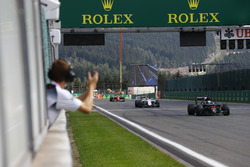 Fernando Alonso, McLaren is congratulated on his seventh place finish