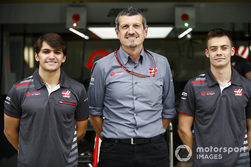 Guenther Steiner, Team Principal, Haas F1, poses with test and development drivers Pietro Fittipaldi and Louis Deletraz.