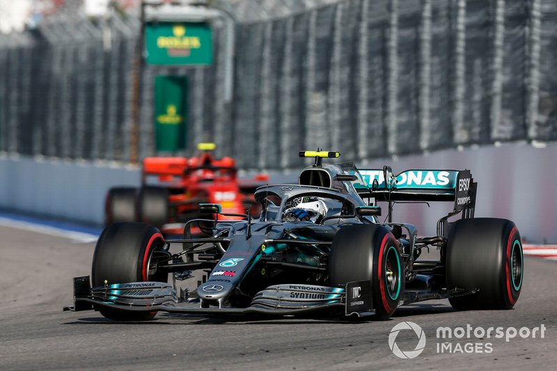 Valtteri Bottas, Mercedes AMG W10, leads Charles Leclerc, Ferrari SF90