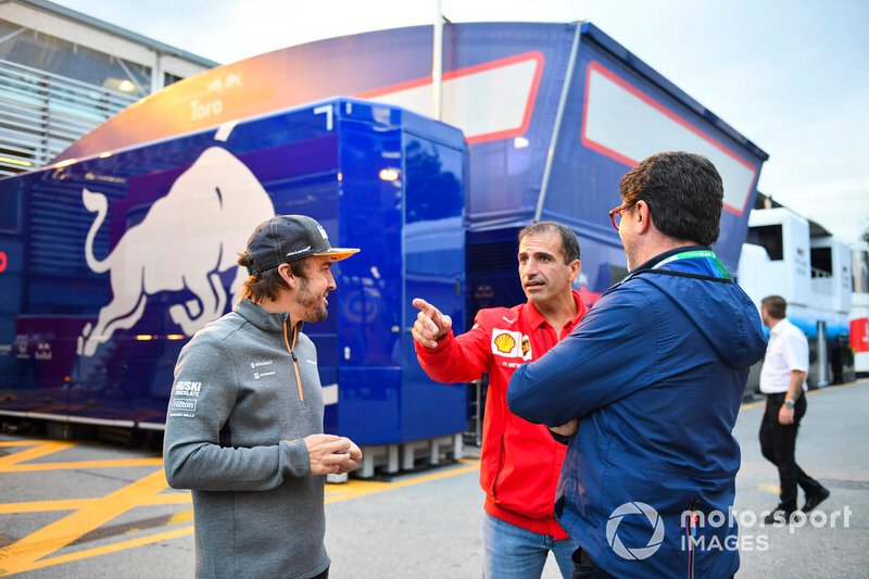 Fernando Alonso, McLaren, with Marc Gene, Ferrari