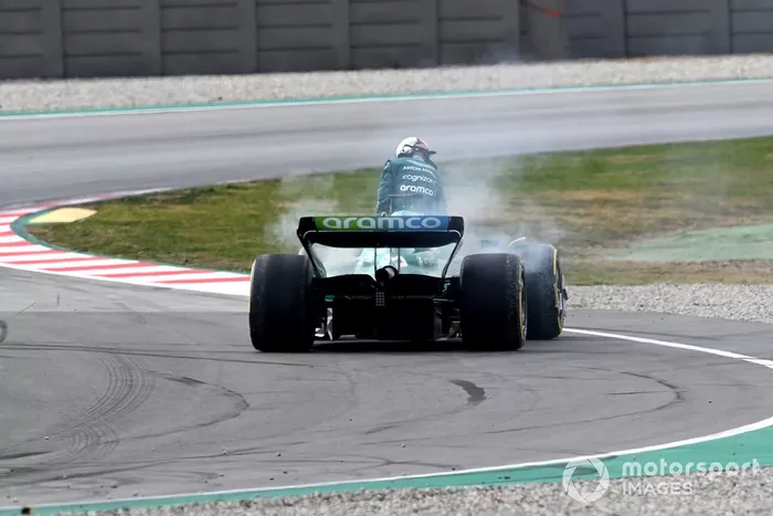 Sebastian Vettel, Aston Martin AMR22, stops with a technical failure resulting in smoke