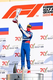 Race Winner Robert Shwartzman, Prema Racing celebrates on the podium with the trophy