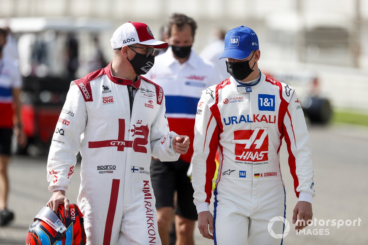 Kimi Raikkonen, Alfa Romeo and Mick Schumacher, Haas F1