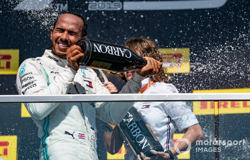 Lewis Hamilton, Mercedes AMG F1, 1st position, sprays Champagne on the podium