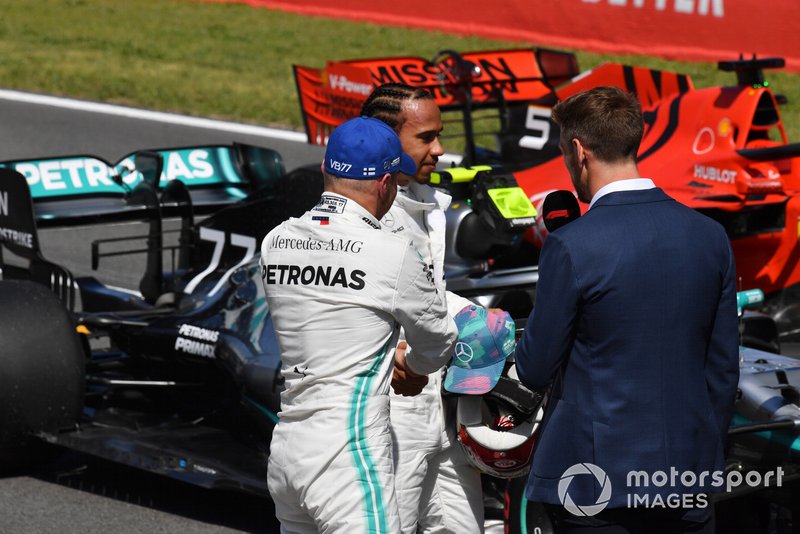 Pole man Valtteri Bottas, Mercedes AMG F1, and Lewis Hamilton, Mercedes AMG F1, are interviewed by Jenson Button, Sky Sports F1, after Qualifying