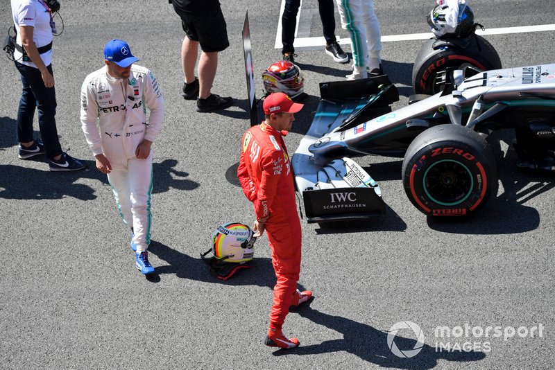 Pole man Valtteri Bottas, Mercedes AMG F1, and Sebastian Vettel, Ferrari, after Qualifying