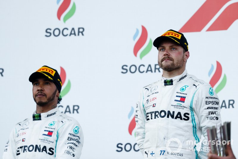 Lewis Hamilton, Mercedes AMG F1, 2nd position, and Valtteri Bottas, Mercedes AMG F1, 1st position, on the podium