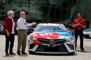 Dona and Gene Griffin, the parents of fallen U.S. Army Sgt. Dale Griffin, join defending Coca-Cola 600 winner Kyle Busch