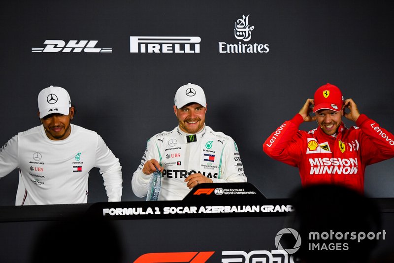 Lewis Hamilton, Mercedes AMG F1, pole man Valtteri Bottas, Mercedes AMG F1, and Sebastian Vettel, Ferrari, in the post Qualifying Press Conference