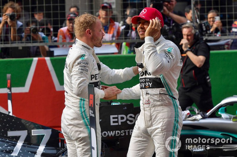 Pole man Valtteri Bottas, Mercedes AMG F1, and Lewis Hamilton, Mercedes AMG F1, congratulate each other