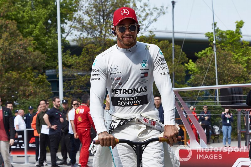Lewis Hamilton, Mercedes AMG F1, on his scooter