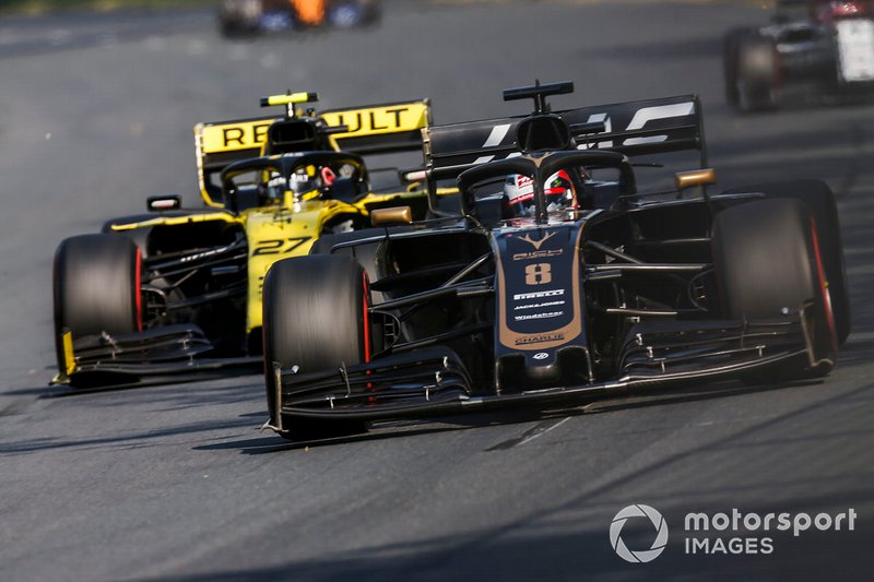 Romain Grosjean, Haas F1 Team VF-19, y Nico Hulkenberg, Renault R.S. 19
