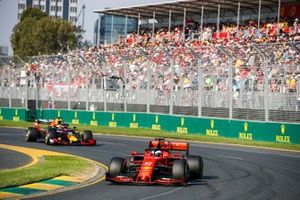 Sebastian Vettel, Ferrari SF90, leads Max Verstappen, Red Bull Racing RB15