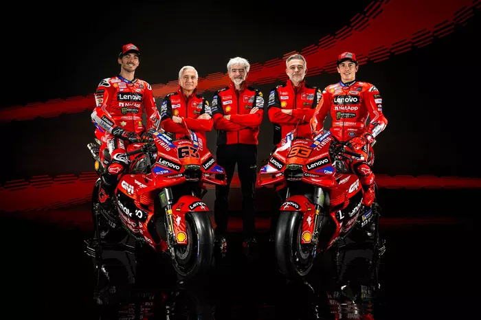 Francesco Bagnaia, Marc Marquez, Ducati Team, with Davide Tardozzi, Ducati team manager, Gigi Dall'Igna, Ducati general manager, Mauro Grassilli, Ducati sporting director