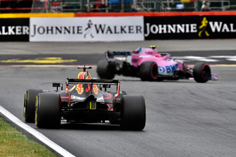 Daniel Ricciardo, Red Bull Racing RB14 and Esteban Ocon, Racing Point Force India VJM11