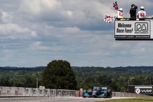 Felix Rosenqvist, Chip Ganassi Racing Honda crosses the finish line