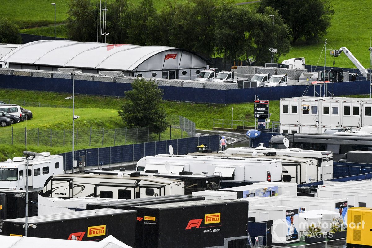 Trucks and motorhomes in the wet paddock