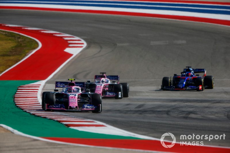 Lance Stroll, Racing Point RP19, leads Sergio Perez, Racing Point RP19, and Daniil Kvyat, Toro Rosso STR14
