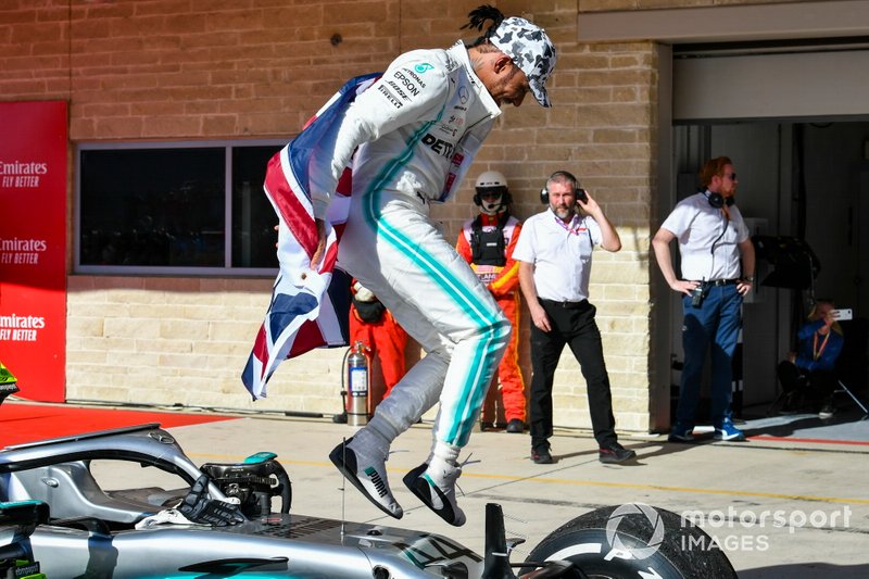 Lewis Hamilton, Mercedes AMG F1, 2nd position, celebrates in Parc Ferme after securing his 6th world drivers championship