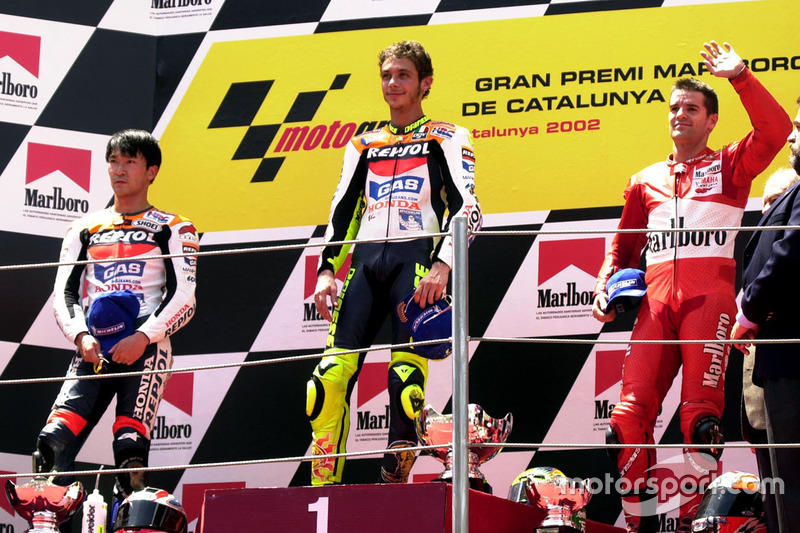 Podium: Sieger Valentino Rossi, Honda Team; 2. Tohru Ukawa, Repsol Honda Team; 3. Carlos Checa, Yama