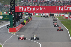Sebastian Vettel, Ferrari SF16-H and Sergio Perez, Sahara Force India F1 VJM09 battle for position