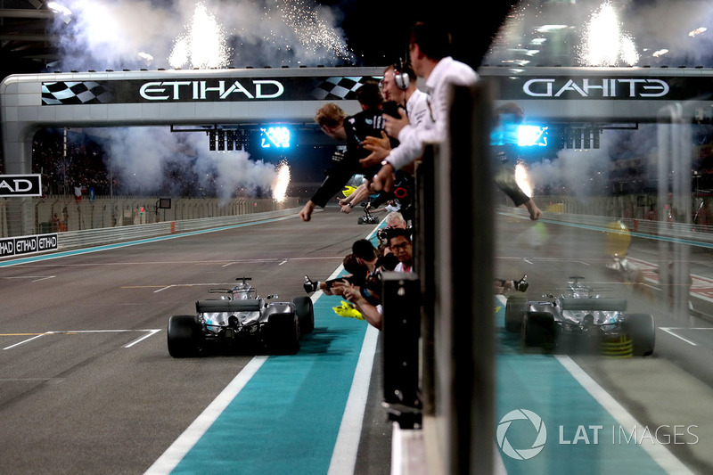 Valtteri Bottas, Mercedes-Benz F1 W08 and Lewis Hamilton, Mercedes-Benz F1 W08 cross the line