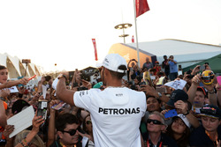 Lewis Hamilton, Mercedes AMG F1 signs autographs for the fans