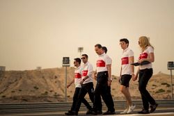 Charles Leclerc, Sauber and Ruth Buscombe, Sauber Race Strategist  walk the track