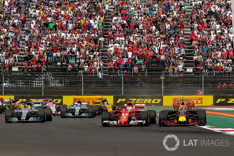 Max Verstappen, Red Bull Racing RB13 leads at the start of the race and collides with Sebastian Vett