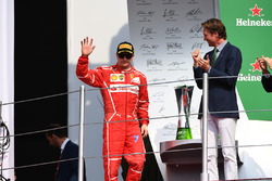 Third place Kimi Raikkonen, Ferrari celebrates on the podium