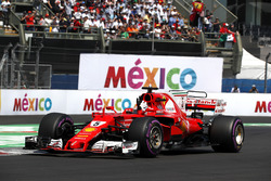 Pole sitter Sebastian Vettel, Ferrari SF70H celebrates and waves to the fans