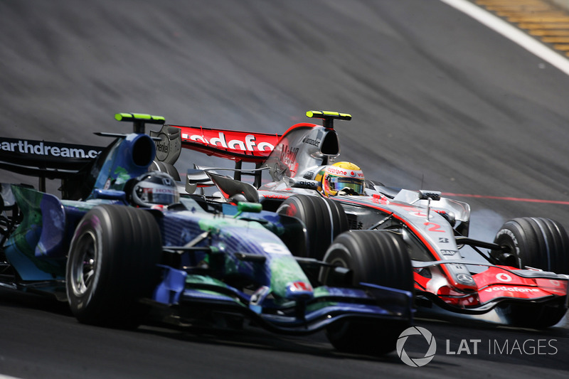Lewis Hamilton, McLaren MP4-22 passes Rubens Barrichello, Honda RA107