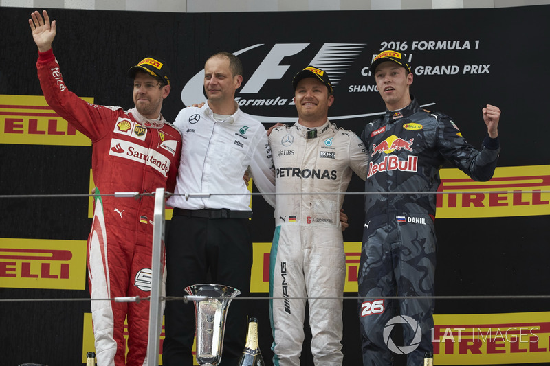 Second place Sebastian Vettel, Ferrari, Tony Ross, Race Engineer, Mercedes AMG F1, Nico Rosberg, Mercedes AMG F1, race winner, Daniil Kvyat, Red Bull Racing, third place, on the podium