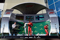 Sebastian Vettel, Ferrari, Lewis Hamilton, Mercedes-AMG F1 and Kimi Raikkonen, Ferrari Celebrate On the podium With the champagne
