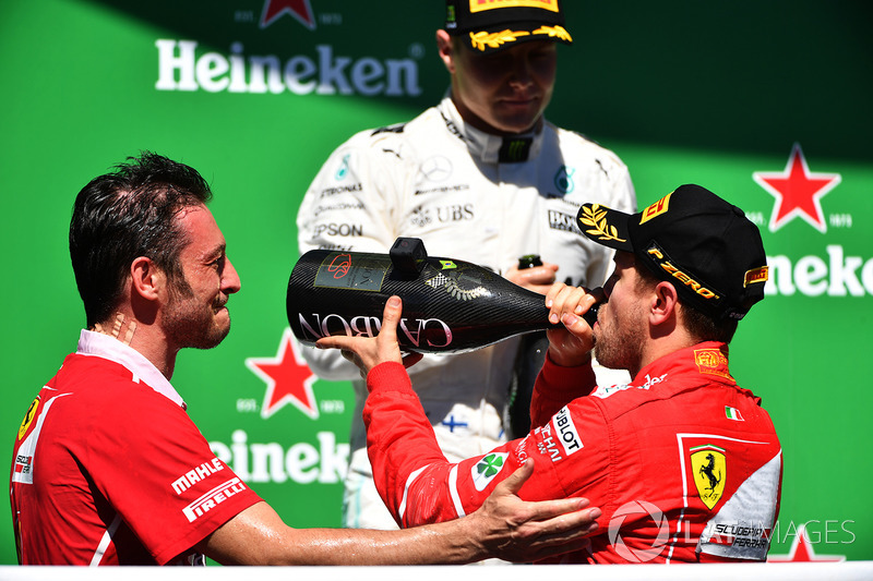 Podium: winner Sebastian Vettel, Ferrari, second place Valtteri Bottas, Mercedes AMG F1, G. Vietina,